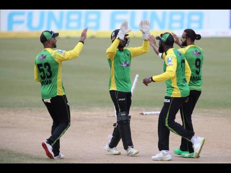 Jamaica Tallawahs players celebrate the wicket of Corbin Bosch of the Barbados Royals during a Caribbean Premier League match at  Queen’s Park Oval in Port-of-Spain, Trinidad and Tobago on September 15, 2022. Tallawahs won by six runs.