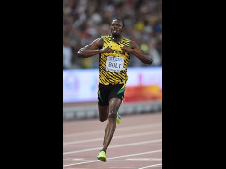 Jamaica’s Usain Bolt celebrates after winning the men’s 200m final at the World Athletics Championships at the Bird’s Nest stadium in Beijing, China, in August 2015.