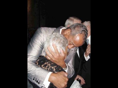
Today, Michael Lee-Chin would do anything to have one more hug, one more dance from his late mother Hyacinth Gloria Chen; to see her smile, kiss, and hold her in the flesh. 