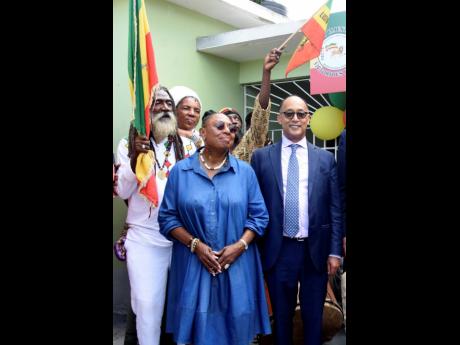 Oliva ‘Babsy’ Grange (centre), minister of culture, gender entertainment and sport, shares lens with Prince Ermias Sahle Selassie (right). Also seen are Ras T (left) and daughter Audrey.