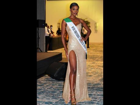Miss Universe Jamaica 2022 Toshami Calvin shone bright in an Uzuri International gown. 