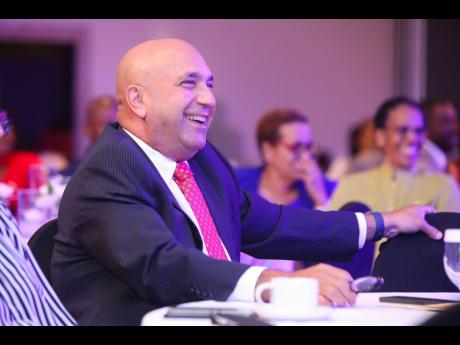 Christopher Zacca, president and chief  executive officer of Sagicor Group Jamaica Limited, was fully engaged by the session.