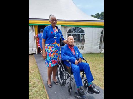 Kenrick ‘Lord Creator’ Patrick (right) and wife, Neseline at the National Honours and Awards Ceremony at King’s House on Monday, where Lord Creator was inducted into the Order of Distinction in the rank of officer.