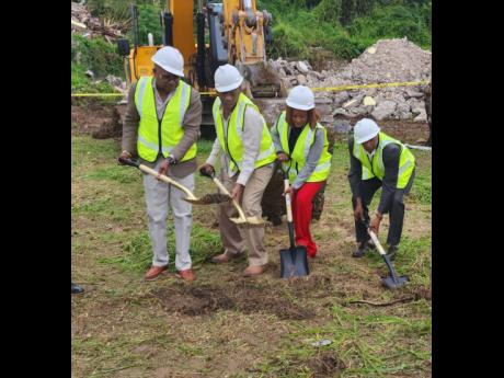 
From left: Minister of Tourism, Edmund Bartlett; Constantine Hinds, C&H Property Development Company; Claudette Crooks, MoneyMasters Real Estate Limited; and John Leiba, chairman of Vista Montego Bay Resorts Development break ground of Friday for the US$1