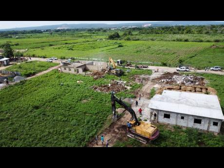 
Several homes near Clifton in the Greater Bernard Lodge area of St Catherine were demolished earlier this month. The sale of the lands was linked to the infamous Clansman Gang in a land scam, Prime Minister Andrew Holness said.