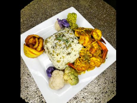 Chef Jeff prepared scrumptious curried shrimp with callaloo rice, presented with a fried sweet plantain, cauliflower and broccoli.