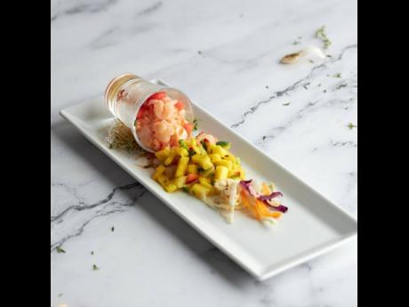 Bahamian-Trini-Hatian Mash Up - Conch ceviche with a pineapple chow and picklese.