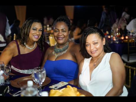 From left:  Dr Arusha Campbell, Attorney Stacy-Ann Young, and pharmaceutical distributor Michelle Eason were sitting pretty.