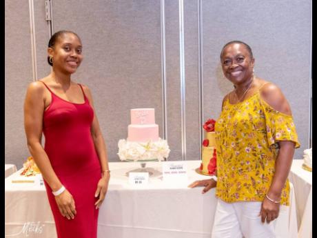 Second place in the bridal shower theme and winner of the best- tasting cake competition, Knakita Clayton-Johnson (left) of Kita’s Cake Artistry poses proudly with her sweet creation alongside her mother, Miriam.
