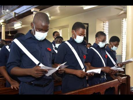 Members of the Jamaica Boys’ Bridage participate in the church service to mark the 128th anniversary of the founding of the oldest uniformed group in Jamaica.