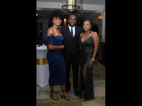 Sandals Resorts International’s Jamie Green is flanked by Jervene Simpson (left) of Sandals & Beaches Negril and Alexia Williams of MBJ Airports. 