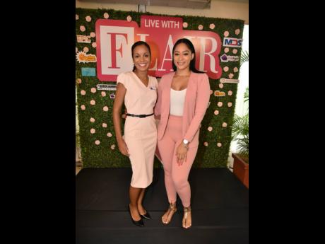 FirstRock Group’s Sherianne Thompson Hart (left) and Khadije Swaby gave us styles to ‘suit’ the occasion. 