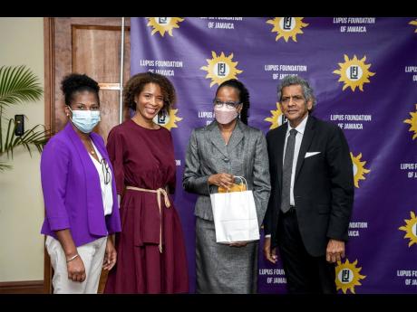 Dr Karen Webster-Kerr (second right), acting chief medical officer, represented the Minister of Health and Wellness at the Lupus Foundation of Jamaica’s (LFJ) annual Lupus Symposium. Board members of the LFJ (from left) are Dr Racquel Lowe-Jones, preside