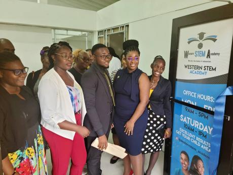 Phelisa Ricketts (second right) and her team at the launch of the Western STEM Academy in Falmouth, Trelawny, on Monday.