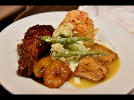 For the main course, honourees and specially invited guests feasted on  traditional roasted hen marinated in Jamaican spices with savoury bread stuffing and pan gravy, and grilled mahi-mahi with garlic butter sauce. These were served with Duchess potatoes 