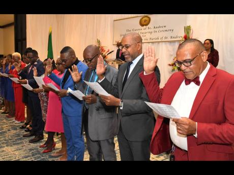 Some of the 150 newly installed justices of the peace for St Andrew participate in a ceremony at The Jamaica Pegasus hotel in New Kingston on Sunday, October 30.