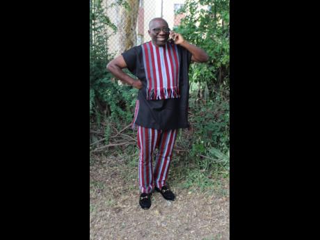 Professor Ernest Madu strikes a pose in this casual striped combo.