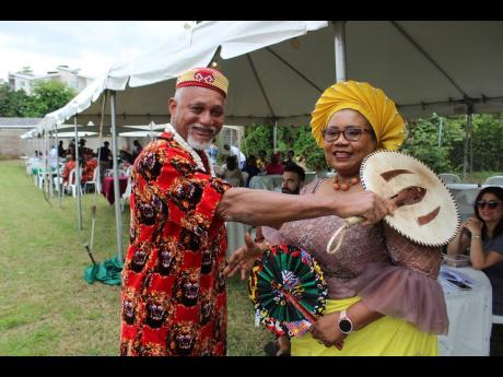 Igbo Chief Dr Joseph Anedu greets Dr Maureen Tamuno, Nigeria’s high commission to Jamaica.