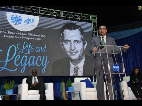 Prime Minister, Andrew Holness addresses the Edward Phillip George Seaga Inaugural Human Development Lecture, held last Thursday at the University of Technology campus, St Andrew.