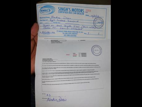 Nadine Dixon’s sales agreement receipt from Singh’s Motors Ltd.