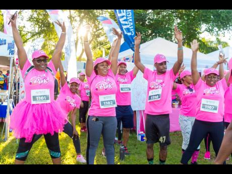 This batch of EdgeChem employees at the ICWI/Jamaica Reach to Recovery Pink Run were warmed up and ready to take on the day’s activities in the fight against breast cancer.