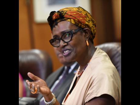 Winnie Byanyima, executive director of UNAIDS, fields questions from journalists at The Gleaner’s North Street, central Kingston, offices Tuesday. 