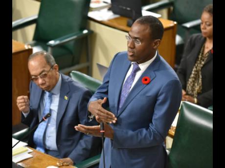 Finance and the Public Service Minister Dr Nigel Clarke delivers details on the First Supplementary Estimates during Tuesday’s sitting of Parliament.
