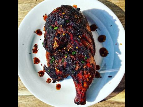 The couple is happy to bring the charcoal flavour of this jerked chicken to please palates both near and far.