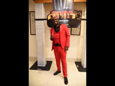  Sting promoter Isaiah Laing was festive in red.
