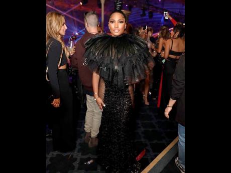 Lesa Millan chose this black Dermoth WIlliams Couture  gown for one of her appearances at BravoCon. 