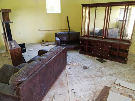 Inside the building, broken furniture and debris littered what was once hailed by its members as a “majestic temple” packed with congregants seeking spiritual healing and a change of fortune.