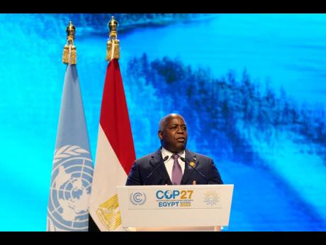 Prime Minister of The Bahamas Philip Davis speaks at the COP27 UN Climate Summit, on November 8, 2022, in Sharm el-Sheikh, Egypt. The police in The Bahamas has announced an investigation into the collapse of FTX, which moved its headquarters to the Caribbe