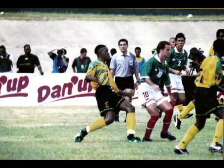 Ian ‘Pepe’ Goodison mans the defence as Jamaica held Mexico nil-all at ‘The Office’ on Sunday, November 16, 1997, to qualify for the 1998 World Cup.


