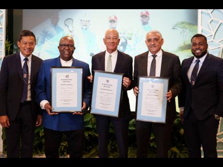   Georgian men of accomplishment (from left) St George’s College Hall of Fame Chairman Donovan Chen See; inductees Francis Price, Stephen Hill and Richard Lake; and  Jezeel Martin, master of ceremonies and Hall of Fame committee member.