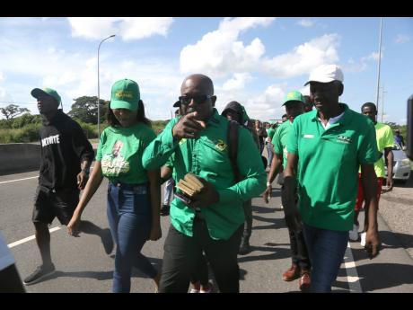 Pearnel Charles Jr, MP for Clarendon South East, armed with envelopes containing stipends for organisers, heading to the Jamaica Labour Party’s 79th annual conference on Sunday.