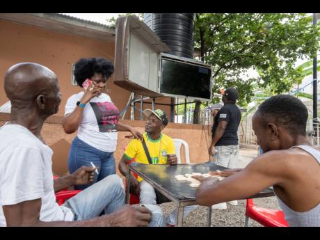 Patrons gather Sunday at a section of Sonia’s Place on the Terrace, a popular bar on Waltham Park Road in St Andrew, to view the opening match of the 2022 World Cup between Qatar and Ecuador. The South Americans won 2-0.