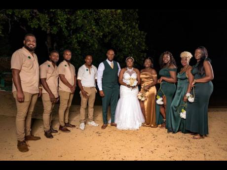 The Walterses’ supportive bridal party was adorned in a combination of khaki attire for the groomsmen and green and gold for the bridesmaids. 