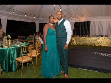 The groom is joined by his mother, Sandra Morris, representing her maternal status in elegant green.