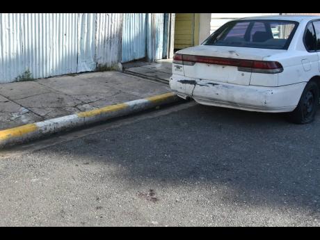 Twenty-four-year-old Terron Hewitt was shot and killed at this spot on Laws Street, Kingston, by a Jamaica Defence Force soldier on Monday.