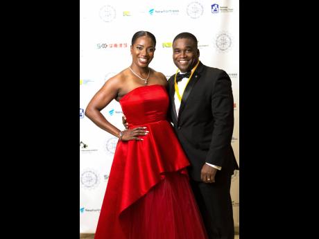  Engineers Marvin Campbell (right), immediate past president, Jamaica Institution of Engineers, and his lovely wife Aisha Campbell, chief executive officer, PROVEN REIT. Engineers Marvin Campbell (right), immediate past president, Jamaica Institution of En