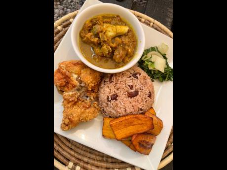 There is no pair quite like curried goat and fried chicken. 