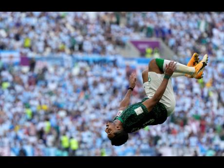 Saudi Arabia’s Salem Al-Dawsari celebrates after scoring his side’s second goal during the World Cup Group C  match against Argentina at the Lusail Stadium in Lusail on Tuesday.
