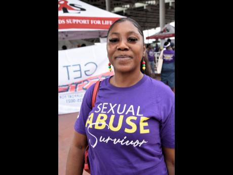 Sandra Greenland hails a decision she made to join the silent protest marking International Day for Elimination of Violence Against Women in the Half-Way Tree, St Andrew, has changed her life for the better.
