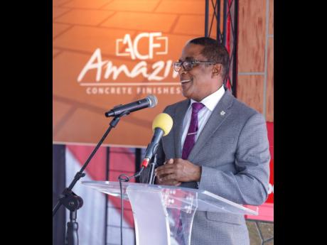 Guest Speaker Dr Noman Dunn, state minister in the Ministry of Industry, Investment and Commerce expressing his praise for ACF at the opening.