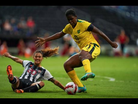 Jamaica’s Khadija Shaw (right) in action againsts Costa Rica’s Fabiola Villalobos during a Concacaf  Women’s Championship  match in Monterrey, Mexico on Monday, July 18.