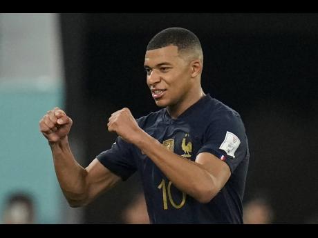 Frenchman Kylian Mbappe celebrates at the end of the World Cup Group D  match between France and Denmark, at the Stadium 974 in Doha, Qatar last Saturday.