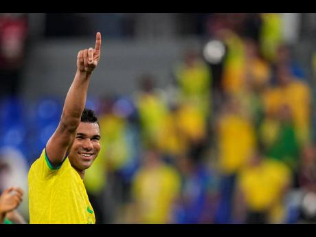 Brazil’s Casemiro celebrates at the end of the World Cup Group G match between Brazil and Switzerland at the Stadium 974 in Doha, Qatar, yesterday. Casemiro scored the winner in Brazil’s 1-0 victory. 