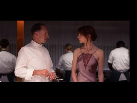 Ralph Fiennes and Ana Taylor-Joy star in ‘The Menu’.