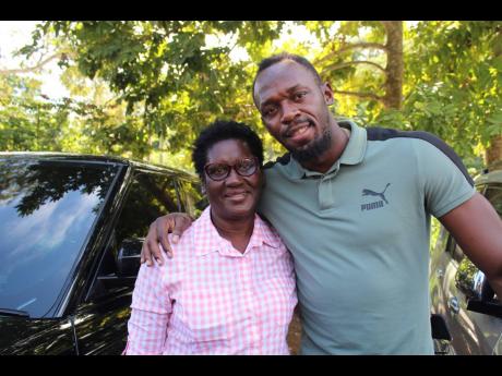 Usain Bolt and his mom, Jennifer Bolt.