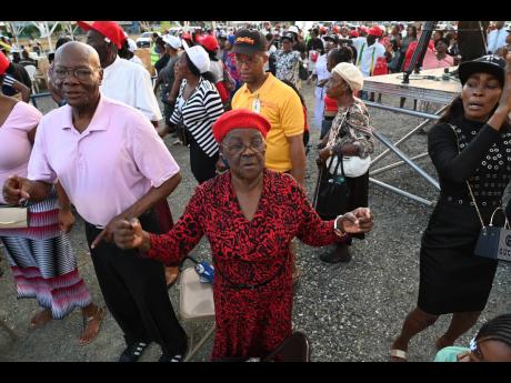 Residents of Portmore gather at the Climate Change Park for the 10,000 Men and Their Family Movement event, which was staged Sunday in association with five ministers’ fraternal from St Catherine. 